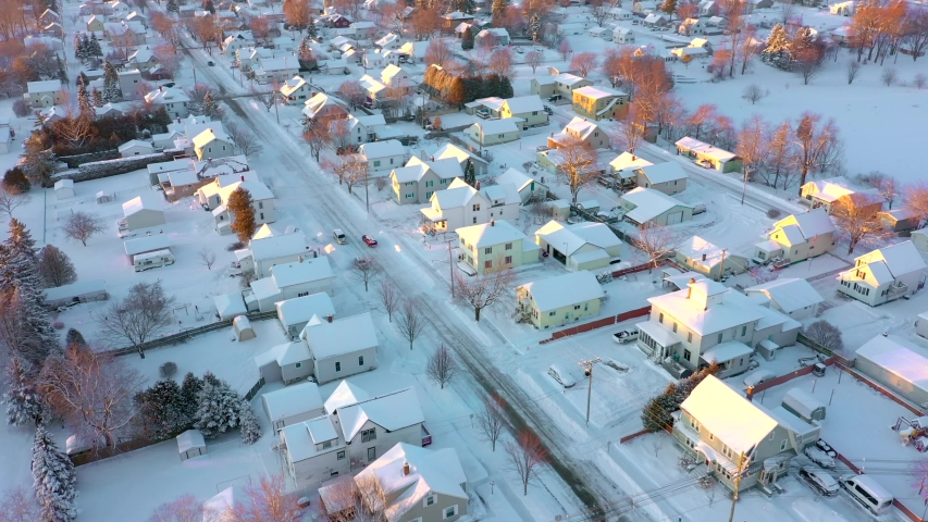 Scenic sunrise flyover view of scenic lakeshore Harbor Town, Algoma, Wisconsin.
