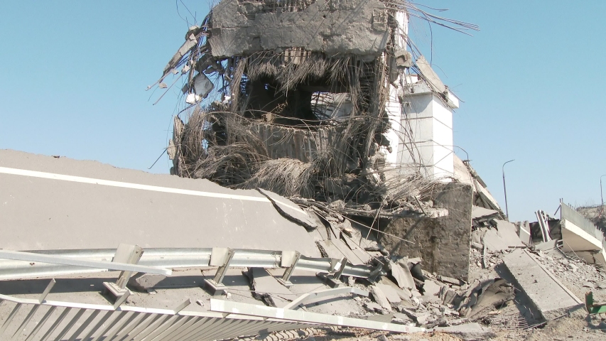 The bridge destroyed after the explosion. Exploded motorway. Act of terrorism. Earthquake. 4k