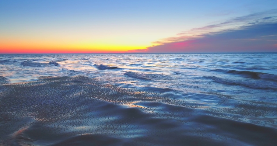Exceptionally scenic Winter landscape on Lake Michigan shoreline at sunrise, aerial view.
