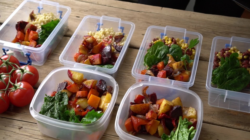 Prep meals at home, then eat on the go. Lunch Portion Control Containers. Advance planning and preparing healthy meals. Organic produce. Keto diet Royalty-Free Stock Footage #1046511343