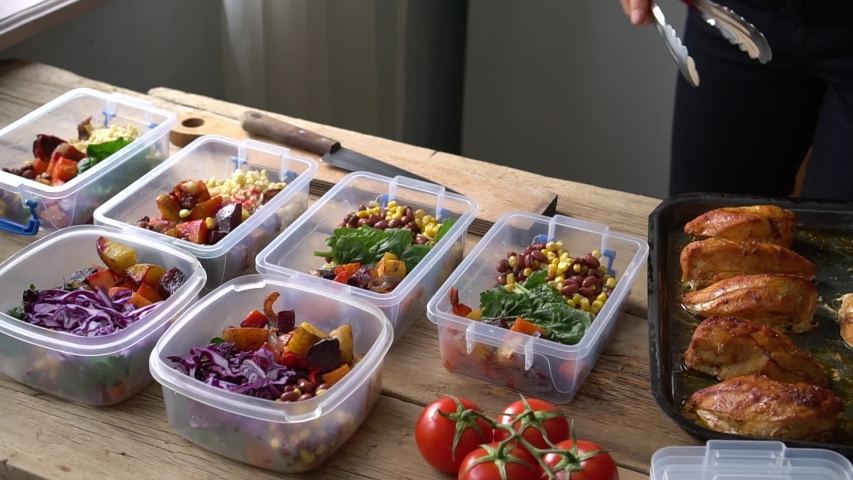 Meal Prep Containers. Planning and preparing healthy meals. Organic produce and ingredients. Oven-Ready and Pre-Prepped meals Royalty-Free Stock Footage #1046511352