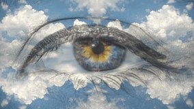 Creative 4k time laps video of moving clouds with reflection and mirror effect as in a kaleidoscope and multi-colored human eye macro close-up moving to the camera. The idea of God, the higher mind.