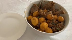 Video of a typical dish made with chicken and pequi, a native fruit of the Brazilian savannah, widely used in cooking, its pulp is soft and tasty, with a peculiar and striking aroma