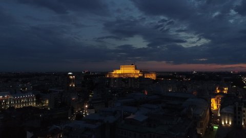 Footage of Palace of Parliament - Bucharest, Romania. Aerial shot , drone flying over old city, night shot Apple Prores