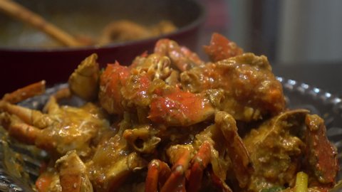Cooking Singapore iconic dish Chilli crab yummy seafood of South East Asia
