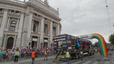 VIENNA AUSTRIA June 16 2018 – LBGT rainbow parade, gay pride parade, Regenbogenparade at the Ringstrasse Wien, party truck with music passing by Burgtheater, background theatre, with sound
