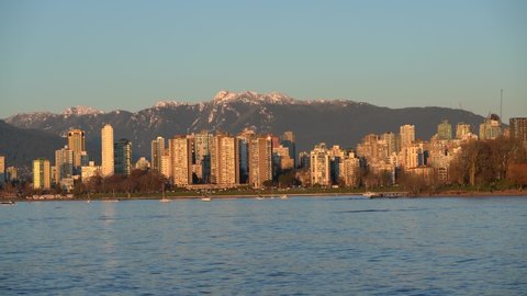 Vancouver BC Canada,February 2020.Vancouver downtown with snow mountain backgorunds
