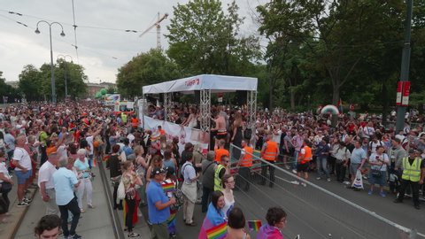 VIENNA AUSTRIA June 16 2018 – LBGT rainbow parade, gay pride parade, Regenbogenparade at the Ringstrasse Wien, party truck passing by, people dancing and cheering many spectatoes watching, sound