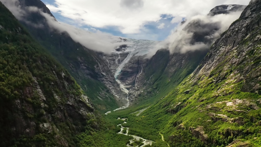 Beautiful Nature Norway natural landscape. Glacier Kjenndalsbreen aerial footage. Royalty-Free Stock Footage #1046650279