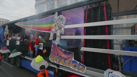 VIENNA AUSTRIA June 16 2018 – LBGT rainbow parade, gay pride parade, Regenbogenparade at the Ringstrasse Wien, party truck with people and music passing by the Burgtheater, spectators watching, sound