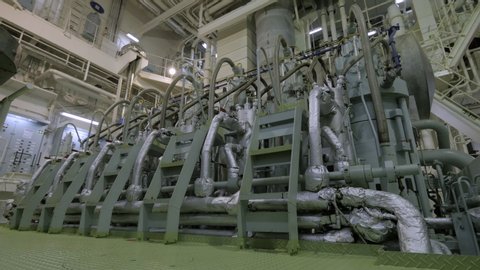Large marine diesel in engine room of ship