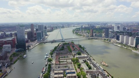 Rotterdam, Netherlands. Norderayland Island ( North Island ) and Erasmus Bridge ( Erasmusbrug ) over the Nieuwe Maas River, Aerial View, Point of interest