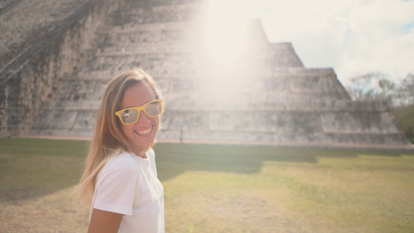 Follow me to concept, couple holding hands at Chichen Itza in Mexico. People travel concept, man's personal perspective of following girlfriend. woman leading man.  Royalty-Free Stock Footage #1046688166