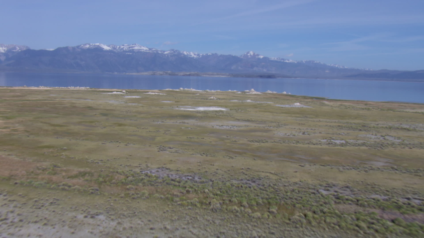 Aerial shot. Aerial view around the Mono Lake, USA. There is the Sierra Nevada mountain in the background. 