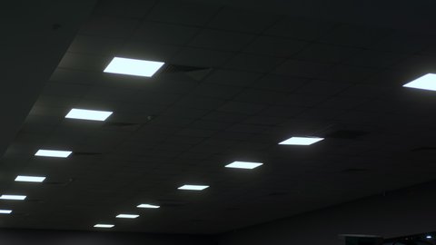 Square Led lamps built into the ceiling glowing in the dark. To include / switch off.