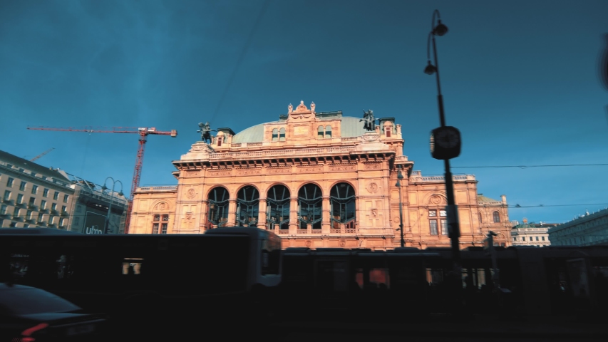 Vienna State Opera hyperlapse, busy street traffic, tourist attraction