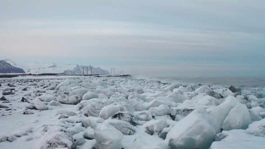 Aerial view of the J kuls rl n glacial lagoon and floating icebergs. The beginning of spring in Iceland
