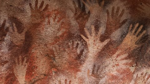 Prehistoric hand paintings at the Cave of Hands (Spanish: Cueva de Las Manos) in Santa Cruz Province, Patagonia, Argentina. The art in the cave dates from 13,000 to 9,000 years ago.