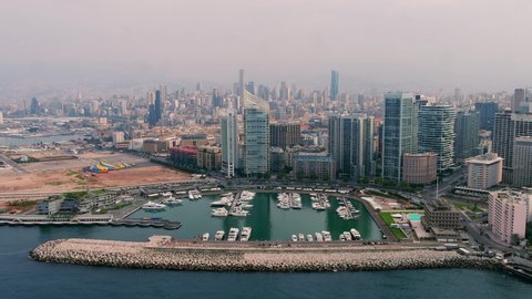 Beirut's Zaytouna Bay sea front with high rise residential buildings and pedestrian walkway along the Mediterranean sea, Lebanon
