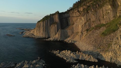 Breathtaking panoramic span over Cape Stolbchaty at sunset. Unique geological volcanic formation, Included in the UNESCO list. Kunashir island.
Kurile Islands. The dispute between Russia and Japan.
