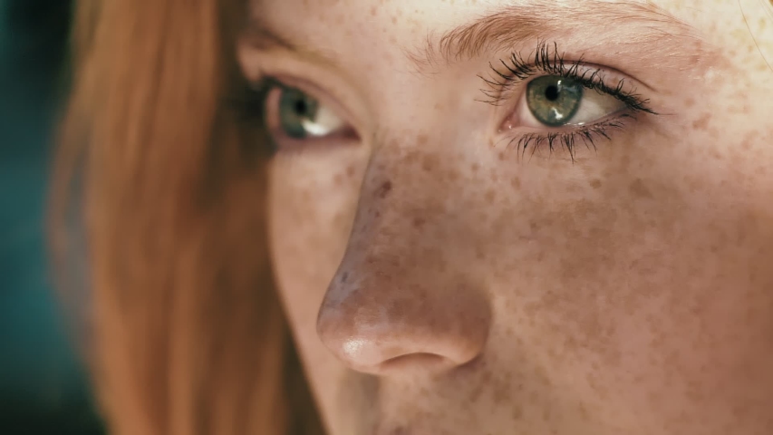Beautiful woman’s eyes opening while looking at Camera, having long nice Eyelashes. Attractive girl with nice Freckles on her Beautiful Face. Red haired woman with Charming Appearance Royalty-Free Stock Footage #1046787226