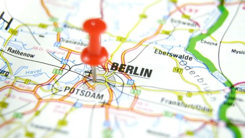 Berlin pinned on a map of Europe. Close up of a road map of Berlin. Berlin, a close up shot of capital of Germany on map. Travel and tourism concept
