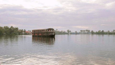 Traditional houseboat at beautiful backwaters in Alleppey, Kerala, India