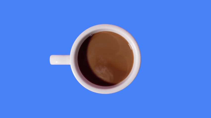 Cup of coffee fills up on the background that changes colors | Shutterstock HD Video #1046858038