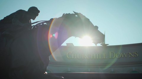 Louisville, Kentucky - January 20, 2020: Kentucky Derby horse statue with lens flare