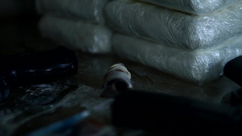 Cinematic Stash Of Cocaine Bricks With Guns And Money, Drugs 4K.