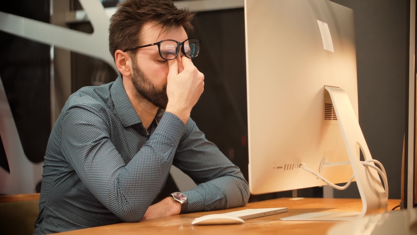 Frustrated Businessman Working Alone.Tired Worker Overworked On Computer.Office Work Overtime. Workaholic Work In Internet Deadline.Tired Businessman In Night Office.Overwhelmed Exhausted Stressed Man | Shutterstock HD Video #1046875981