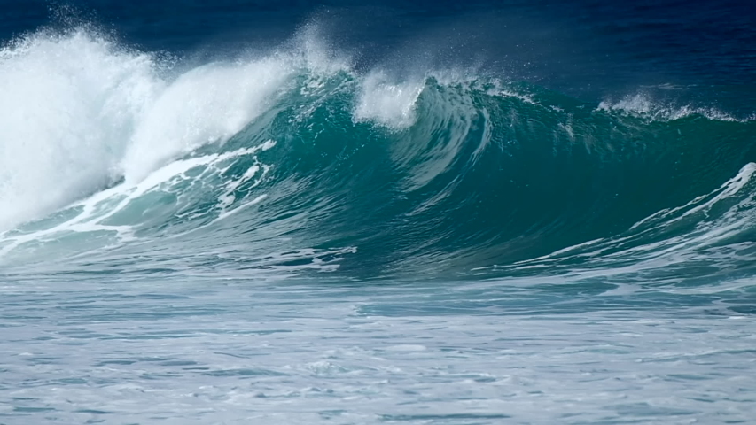 Wave breaks at the Banzai Pipeline surf spot on Oahu island in Hawaii | Shutterstock HD Video #1046878522