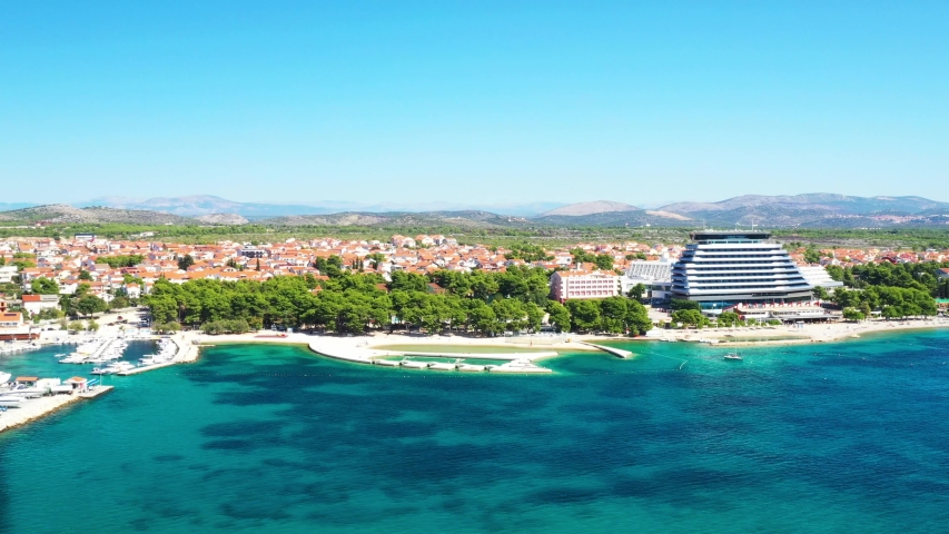 Touristic resorts in town of Vodice, amazing turquoise coastline on Adriatic coast, aerial view, Croatia