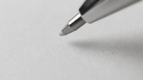 A question mark with a blue gel pen is drawn on white paper. - Powered by Shutterstock - Get 15% off with code: PIKWIZARD15