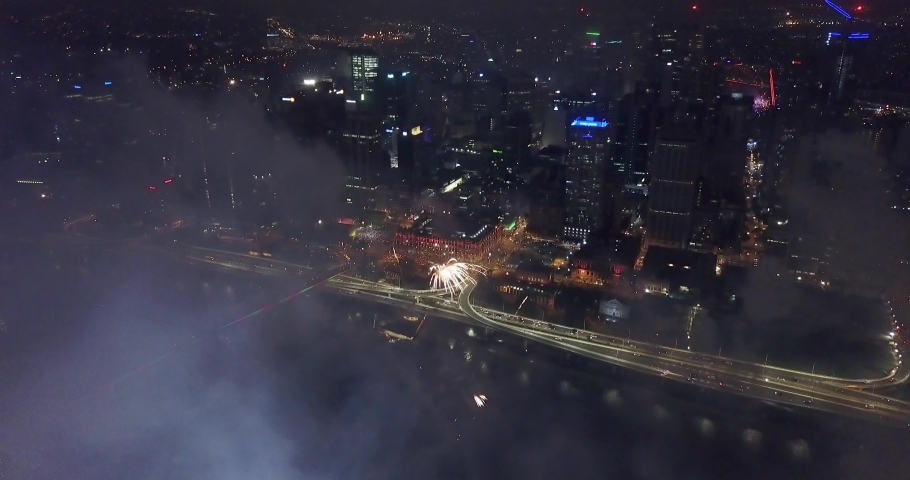 AERIAL New Year fireworks over Brisbane city, CBD, Australia