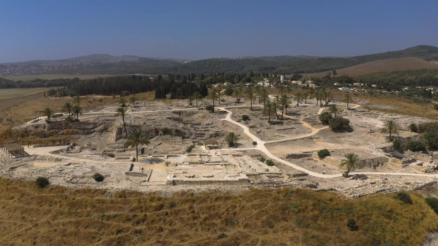 Flying around the Archeological site of Biblical Tel Megiddo, at Megiddo National Park Israel also known as Armageddon the end of the world