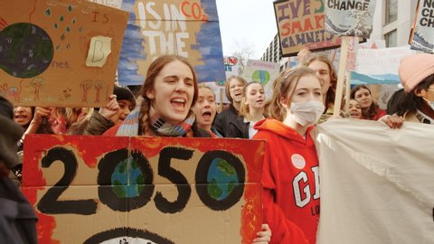 LONDON, circa 2020 - Hundreds of students took to the streets of Westminster and Downing Street, London, England, UK to demonstrate against climate change