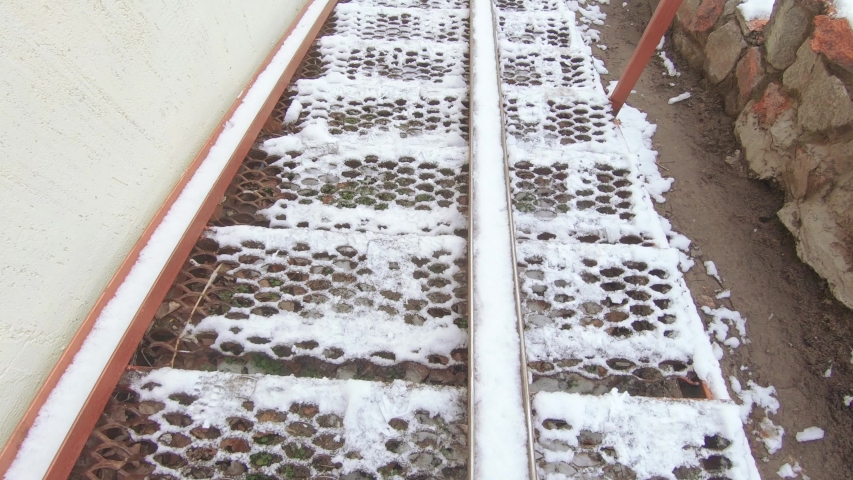 An old iron staircase on the banks of the Dnieper in the area of Pridneprovsk park