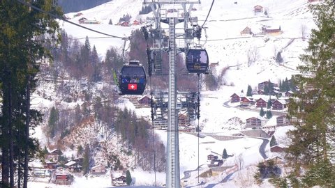 Ride in a cable car in the Alps on a winter's day - ENGELBERG, SWITZERLAND - FEBRUARY 5. 2020