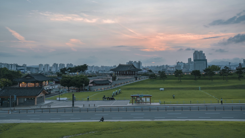 Time-lapse of Hwaseong Fortress skyline at sunset in Suwon South Korea.