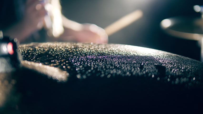 Close up of a cymbal getting hit and splashes of water Royalty-Free Stock Footage #1047029128