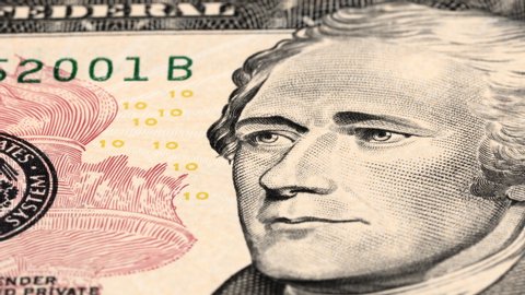 Alexander Hamilton on US 10 dollar bill tracking. Slider shot. Low angle, macro. 4K