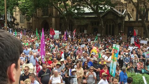 Sydney, Australia -February 22, 2020: HD Video -Large crowd of people gathering at Sydney Town Hall demanding the Australian Government to declare Climate Emergency and protest the use of fossil fuel.