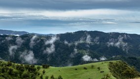 Rural mountain landscape of Zlatibor Serbia timelapse. Time lapse video of a rural country mountain landscape with untouched nature of Zlatibor, Serbia with clouds and fog in the background.