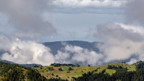 Rural mountain landscape of Zlatibor Serbia timelapse. Time lapse video of a rural country mountain landscape with untouched nature of Zlatibor, Serbia with clouds and fog in the background.