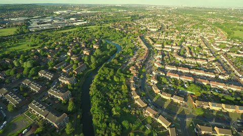 Aerial view over houses in English countryside