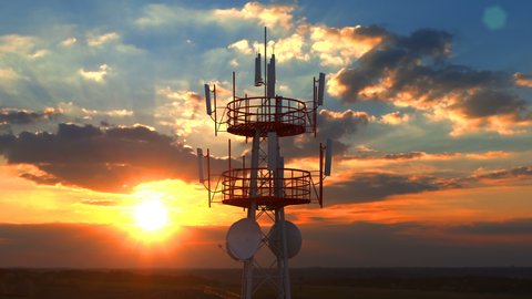 Aerial view of the top of telecommunication tower. Its antennas designed for transmitting cellular mobile signals covering large areas providing high speed 4g and modern 5g traffic network service.