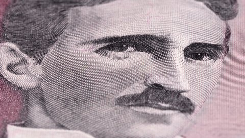 Nikola Tesla portrait on Yugoslavia 5 dinars (1994) banknote tracking. Slider shot. Low angle, macro. 4K