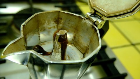 Homemade italian espresso coffee with moka machine, caffeine addiction habit