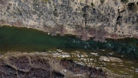 a 4k aerial clip of a man fly fishing on the San Jaun River in New Mexico.